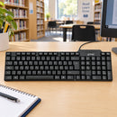 Teclado USB Basik Tech BSK08T Negro — escena de biblioteca escolar