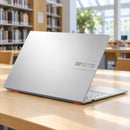 ASUS Vivobook Go 15 E1504FA silver — escena de biblioteca