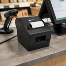 Impresora POS Térmica 80 mm Jaltech en mostrador de comercio