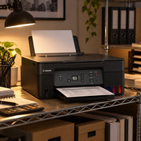 Impresora Canon PIXMA G2170 MegaTank multifuncional USB — documentos en una oficina contable
