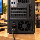 Fuente de poder ATX Unitec referencia 750W negra — panel posterior instalado en un computador